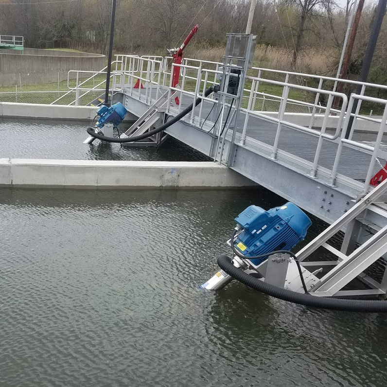 Newterra Triton aeration equipment on surface of treatment pond