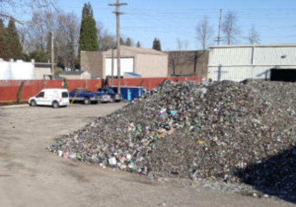 A debris pile in an industrial processing area