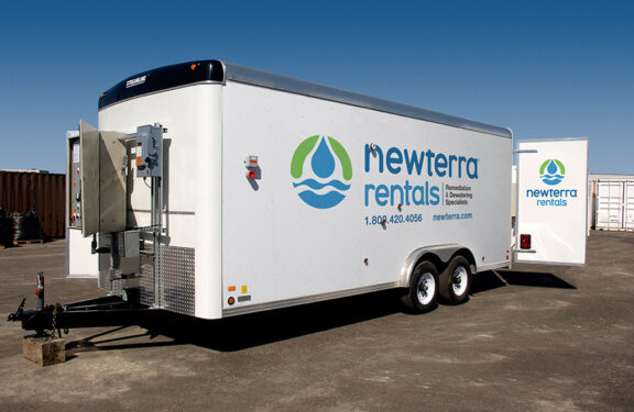 Long view of a Newterra rental trailer for mobile water treatment services