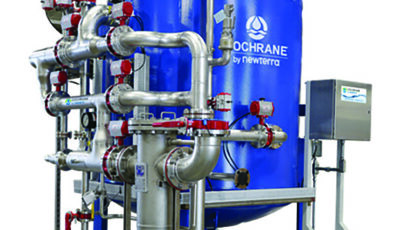 Product image with white background of a Cochrane by Newterra Ion exchange unit consisting of a metal frame supporting a blue elevated vessel connected to pipes of various sizes with gauges, levered valves and an electrical box