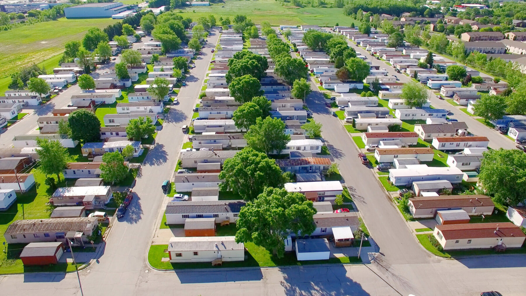 Aerial view of a trailer parkin a medium sized town