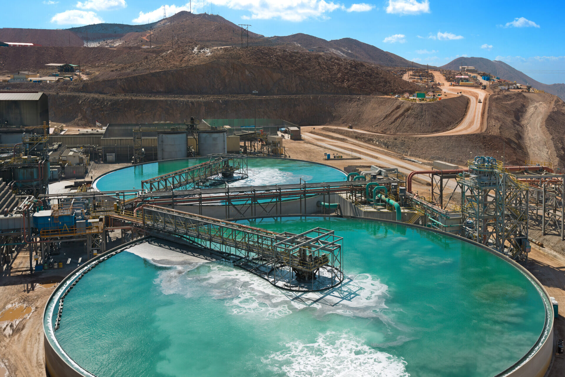 Drone view of modern tailings ponds being treated in a mining environment