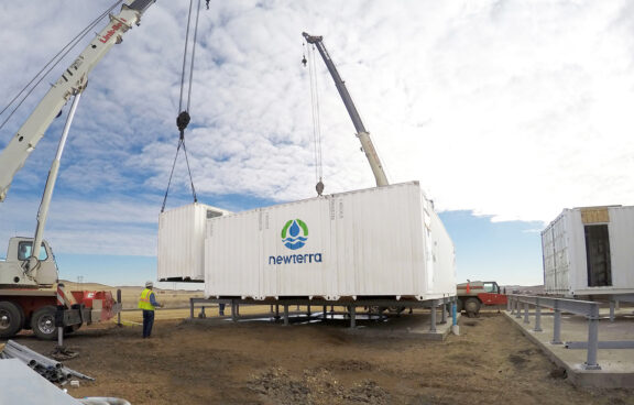 Kildeer-MBR-1 Water treatment professionals gather around a water treatment tank