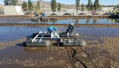 Newterra Triton aeration equipment on surface of treatment pond