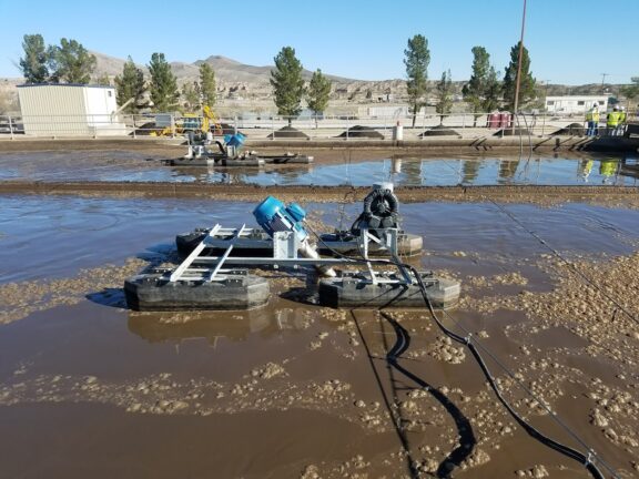 Newterra Triton aeration equipment on surface of treatment pond