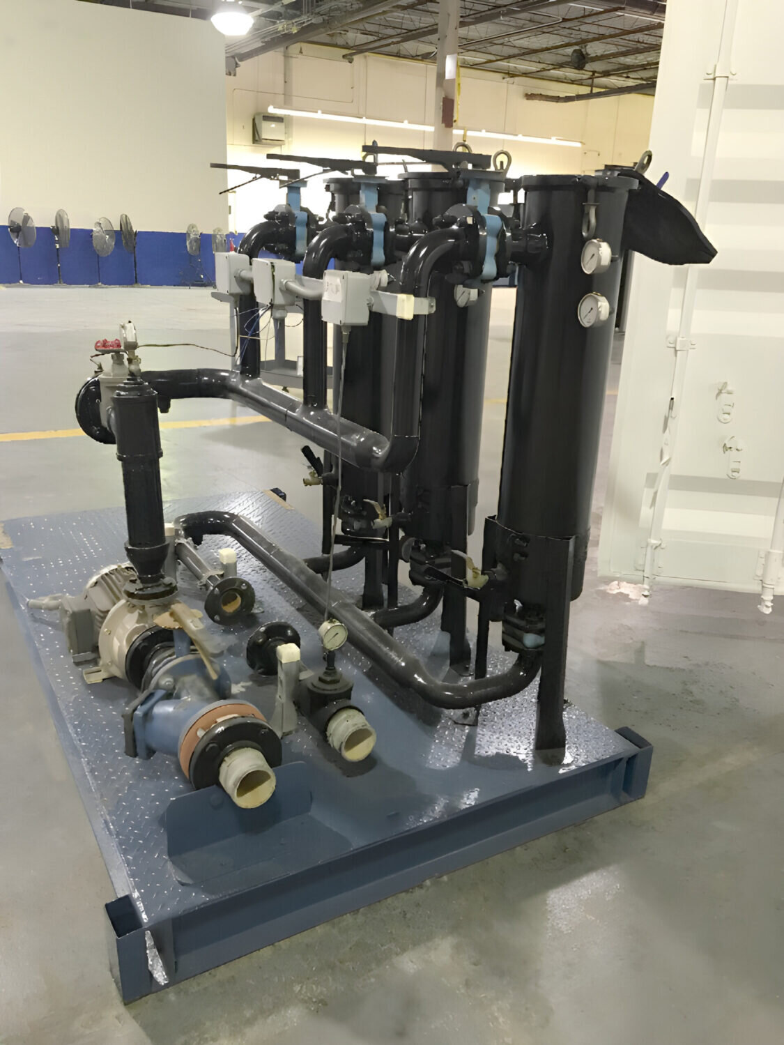 Newterra bag filter on a skid in a facility.