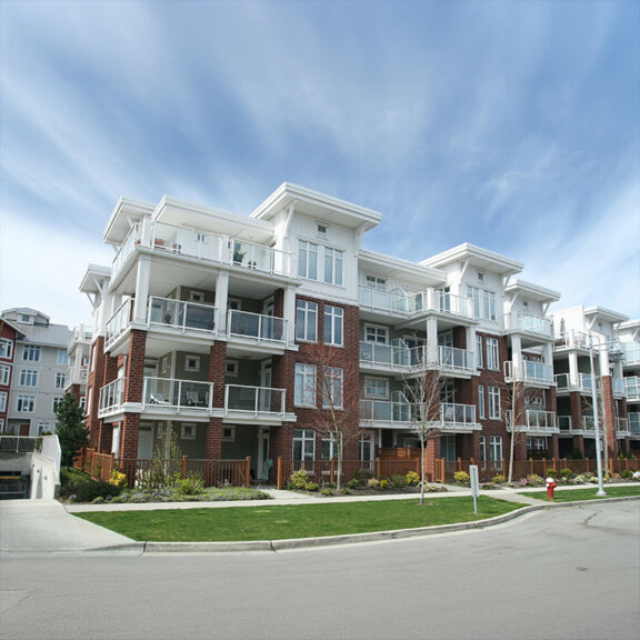 case-study-main-image_750x750-rocky-point-1 A resort on a cliff overlooking the ocean with a sunset in the background